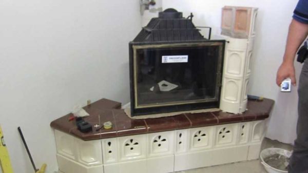 This is a Czech stove tile. Mounted on special racks