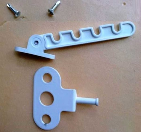 It looks like a PVC window opening limiter