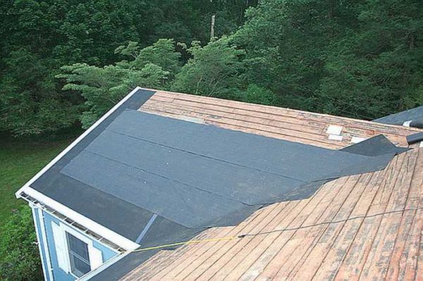 On pitched roofs, a solid base is made under a rolled roof