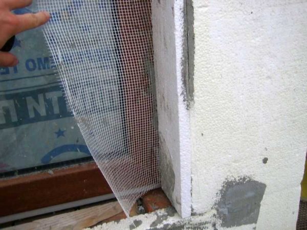 Insulation of the facade with foam starts from the slopes