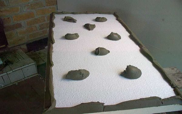 Apply glue like this, but only on walls, not on foam