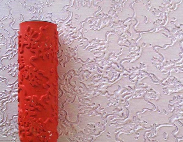 A simple way - rolling with a roller with a pattern formed on it