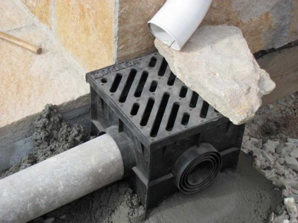 Installation of a storm water inlet - pour concrete and load with something heavy so as not to squeeze out