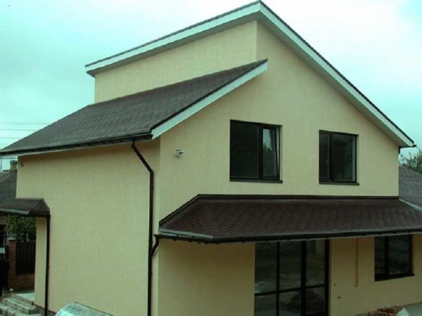 Two pitched roofs at different levels