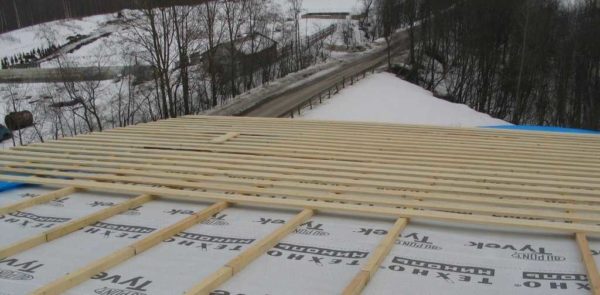 We lay a waterproofing windproof vapor-permeable membrane