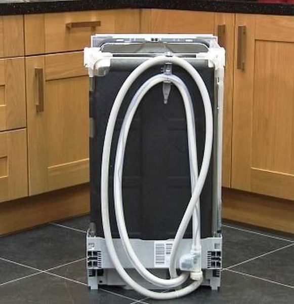 Inlet and drain hoses attached at the back