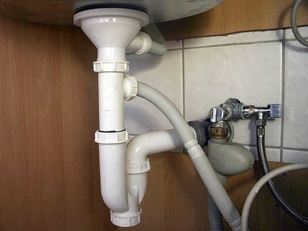One of the siphons for connecting the washing machine to the sewer