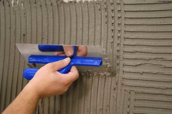 When plaster is applied in two layers, a relief is formed on the first