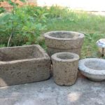 Ready-made homemade vases and pots made of concrete for outdoor flowers