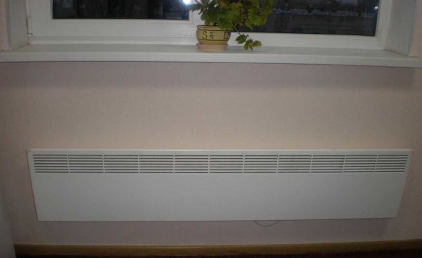 Electric conduits externally - usually flat panels with grilles
