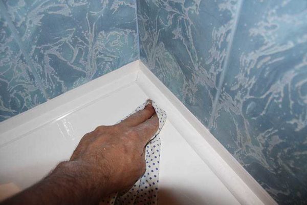 Wipe off excess with a soft cloth