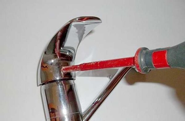 First, unscrew the fixing screw