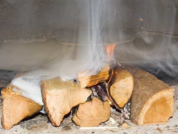 The use of raw wood leads to the accumulation of soot deposits