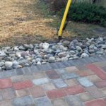 Open drainage near the driveway, parking lot, does not spoil the picture at all