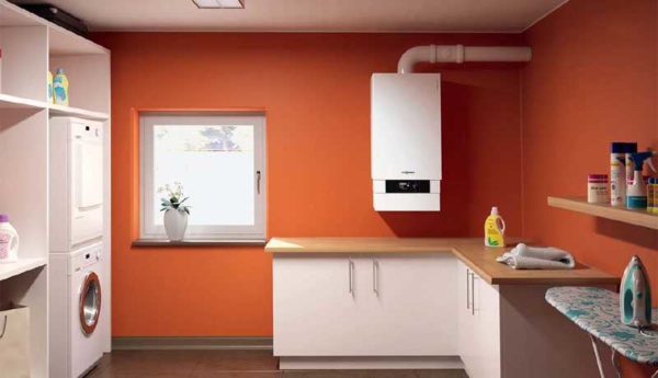 Wall mounted double-circuit gas boiler has the dimensions of a small cabinet
