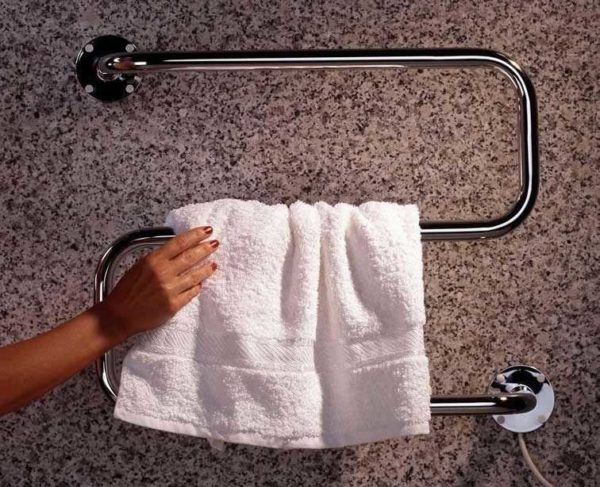 A heated towel rail in the bathroom is a handy piece