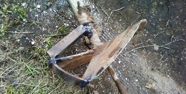 Reinforcement of hand drill for drilling holes in dense soils