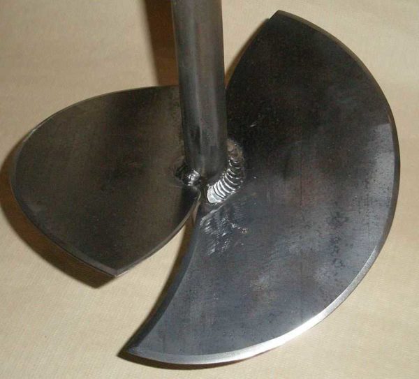 An example of a homemade earthen garden drill