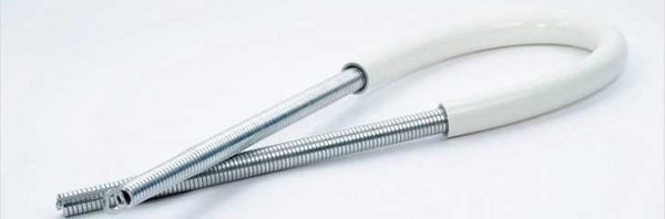 Spring for bending metal-plastic pipes