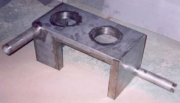 The best option is to make a water jacket in the shape of an oven (this one is for a metal one with burners)