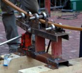 Profile tube bender with lifting platform