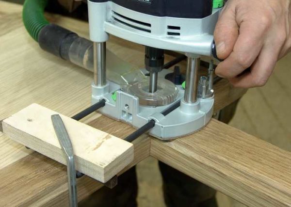 One of the models - with a connected vacuum cleaner for removing chips