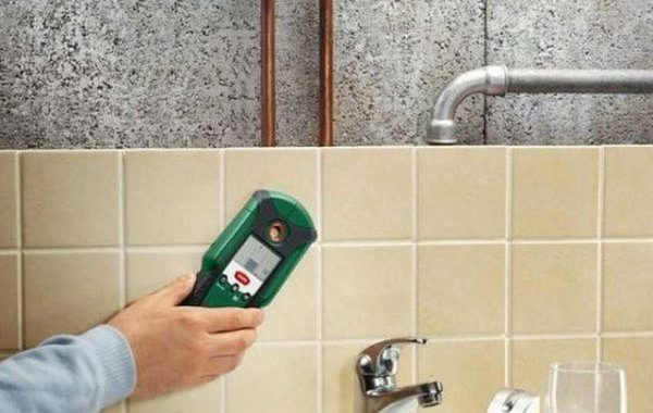 Finding hidden pipes or wires behind plaster or tiles is a task that a hidden leash device can perform.