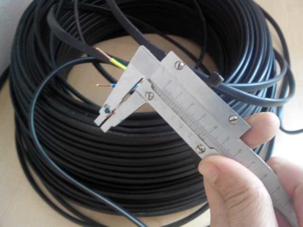 A caliper or micrometer is required to determine the real cross-section of the wire