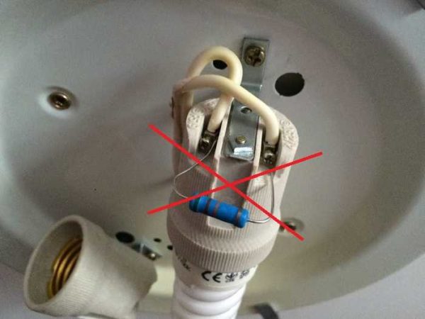 Here you can see where you need to connect the resistor, but you shouldn't do it as in the photo: it's easy to short