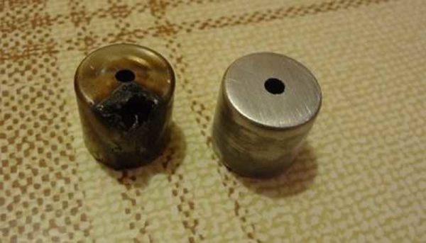 Old damaged cap and a new one from the capacitor