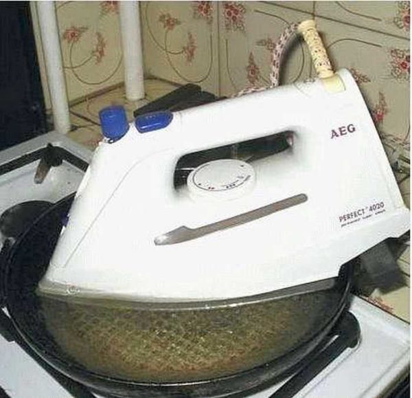 Cleaning the steam vents on the iron