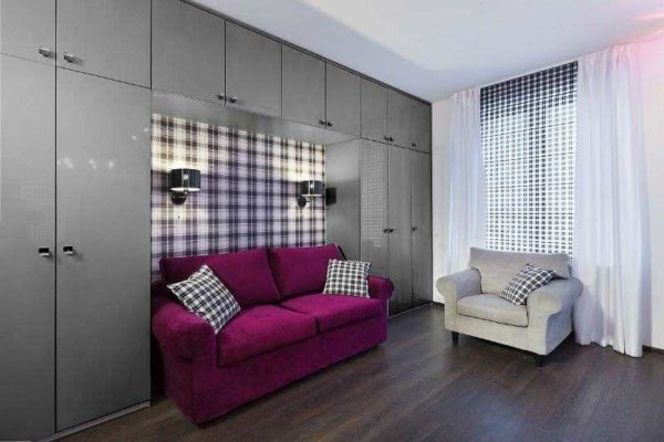 Above a sofa or armchair, the height of the sconce is determined experimentally - stretching out your hand