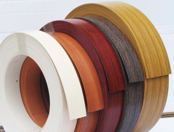 Paper or melamine edging is the cheapest, but also the most short-lived option for finishing furniture ends