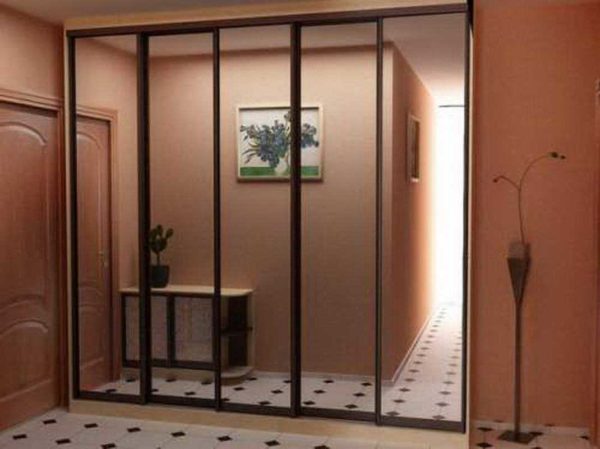 Just a mirrored surface makes a small room more spacious