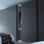 Dark matte color for a large, bright bedroom