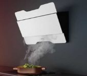 The inclined hood looks completely non-standard, and the entire filling can be hidden behind a false wall