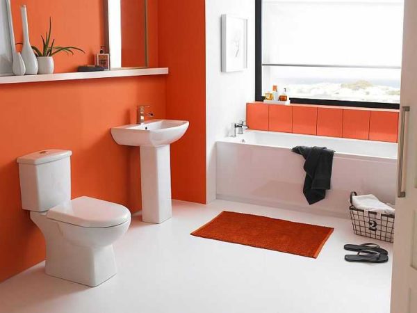 Sunny orange walls in the bathroom