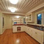 It looks like a PVC tile on the ceiling - one of the options