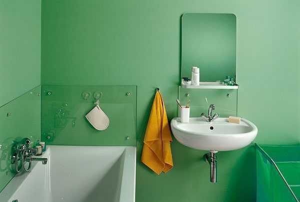 You can protect the wallpaper from direct contact with water with panels of glass or transparent plastic