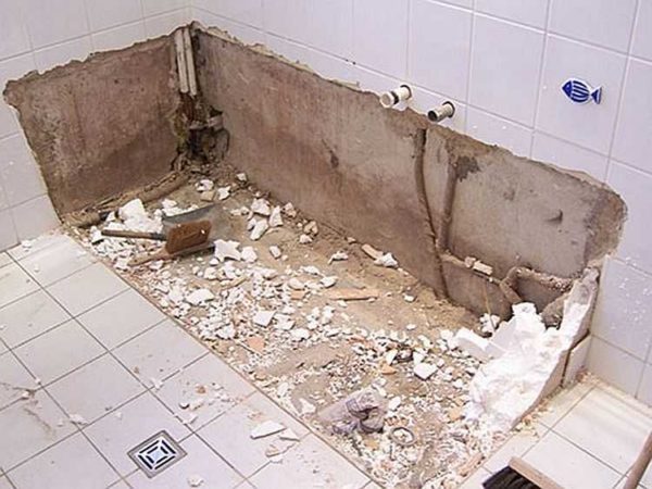 The first stage of bathroom renovation - plumbing dismantling
