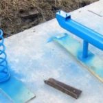 Spring and cleaver for wood splitter