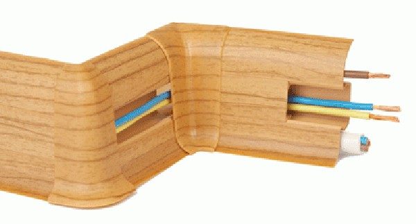 This is a plastic skirting board with molded cable routing