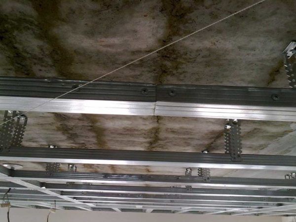 First, the guide ceiling profiles are mounted