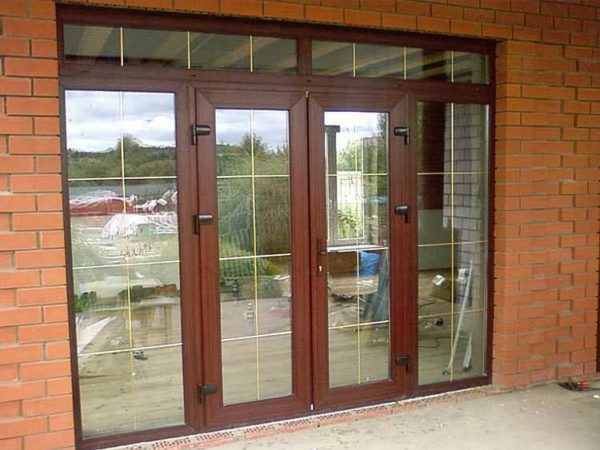 Plastic entrance doors can be part of the entrance group - with windows on the sides
