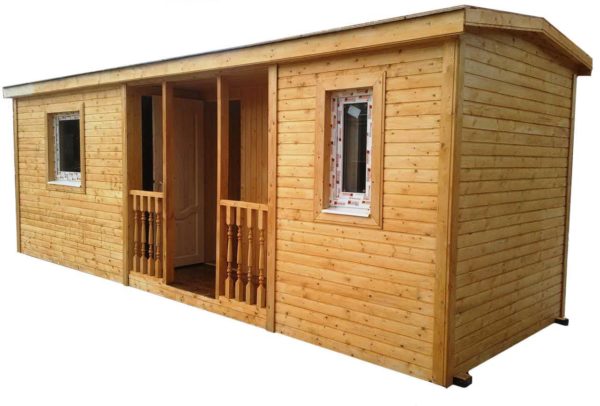 A wooden summer cottage with a toilet and shower is the most common option
