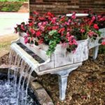 Is the ancient piano lying in the bushes? From it you can make not only a flower garden, but also a waterfall ...