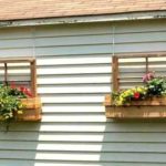 Crafts for a summer cottage and a garden - such hanging boxes will decorate both the wall of the house and the barn