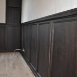 In classic interiors, MDF wall panels with imitation of valuable types of wood are used: veneered MDF can hardly be distinguished from solid wood