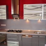 Most often, steel wall panels can be seen in the kitchen on the working wall