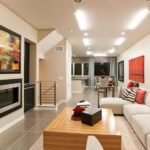 Roughly the same range, but for a living room in a different style - here instead of green, black details, which gives more coldness to the atmosphere